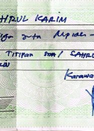 Foto: Kwitansi tanda terima uang yang ditandatangani Ag.
